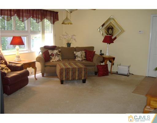 7 Ridge Road Old Bridge, NJ 08857 - Photo 5 of 15 a living room with furniture and a window