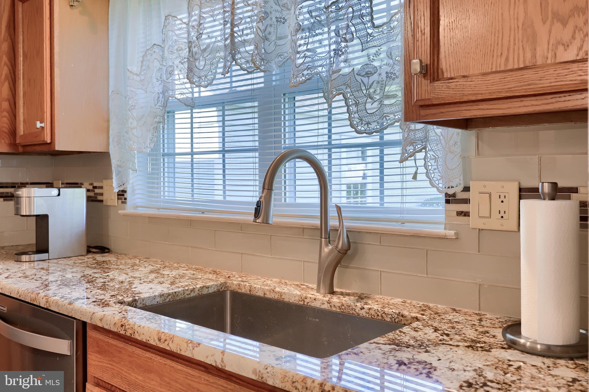 1800 Wexford Road Palmyra, PA 17078 - Photo 16 of 36 Granite Countertop with Tile Backsplash