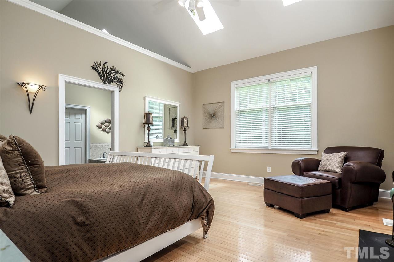 299 Howard Tant Road Zebulon, NC 27597 - Photo 11 of 25 The split Bedroom plan features a true Master Suite: bright vaulted Master Bedroom w/2 skylights, CF, lots of windows & gas log FP; big cedar-lined WIC; huge vaulted Master Bath, and adjacent SittingRm/Office/Nursery.