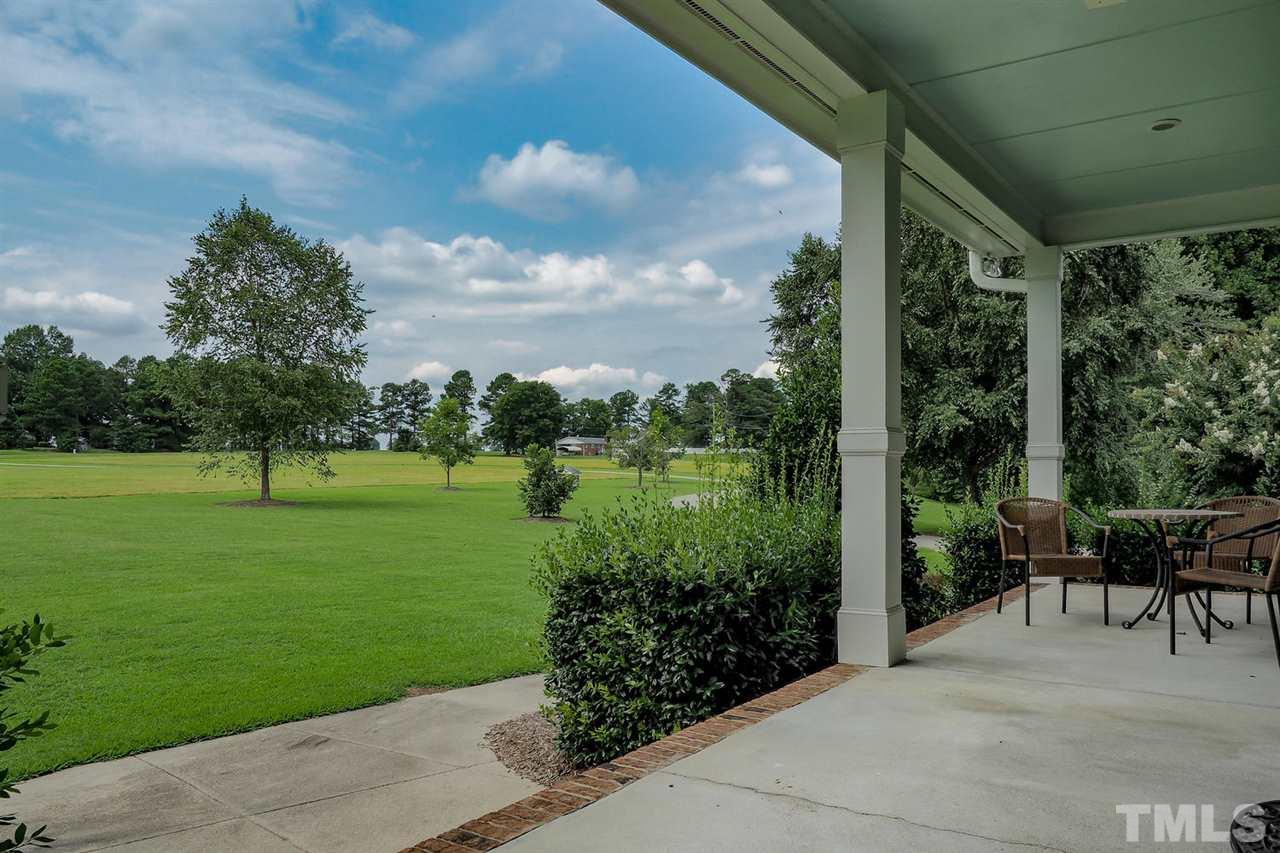 299 Howard Tant Road Zebulon, NC 27597 - Photo 2 of 25 This home has an oversized attached side-load 2-car Garage w/storage rm, huge wrap-around front Porch, Screened Porch, Deck, huge Patio, garden beds, 2 fenced dog pens, Storage Bldg & Shelter.