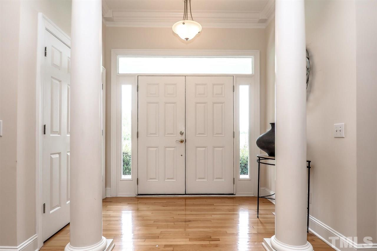 299 Howard Tant Road Zebulon, NC 27597 - Photo 3 of 25 This home offers 10’ ceilings, heavy molding & hardwd floors throughout. The gracious Foyer w/lg coat closet opens through columns to the lg vaulted Living Rm.