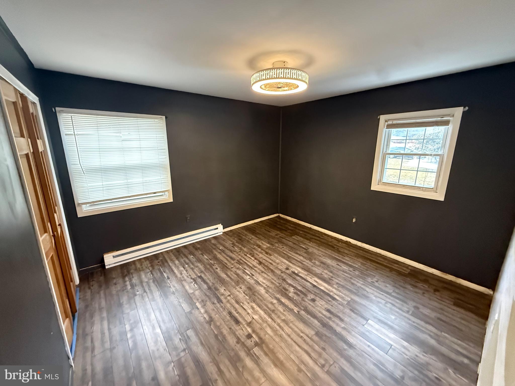 730 East Main Street Weatherly, PA 18255 - Photo 11 of 15 Modern space with dark walls and natural light.