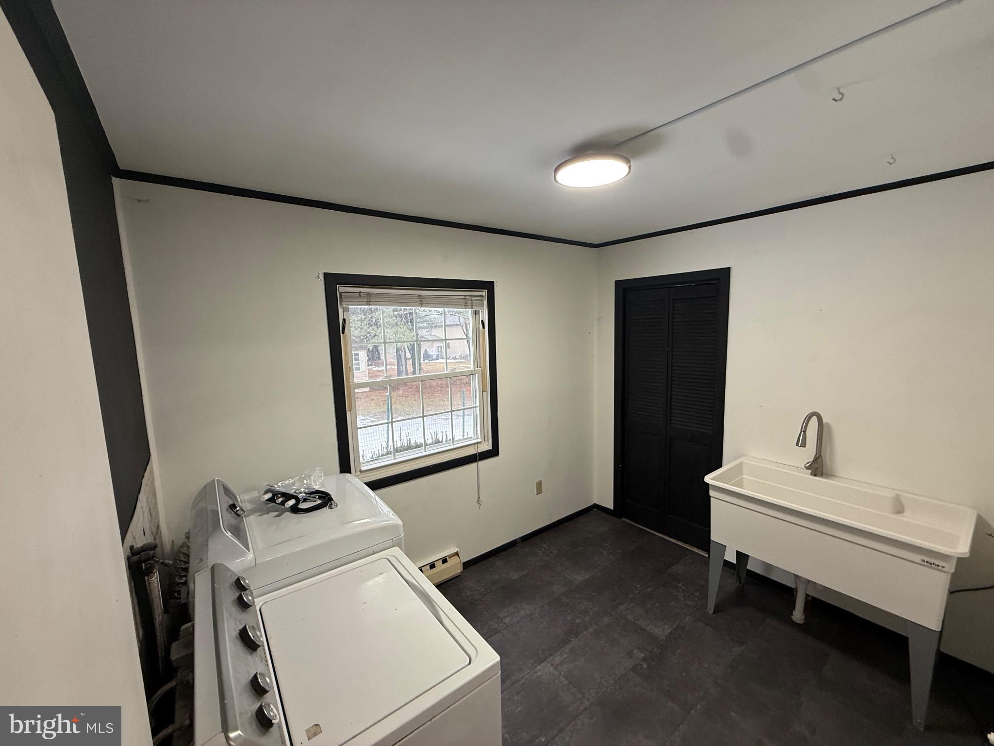 730 East Main Street Weatherly, PA 18255 - Photo 15 of 15 Modern laundry space with sleek design.