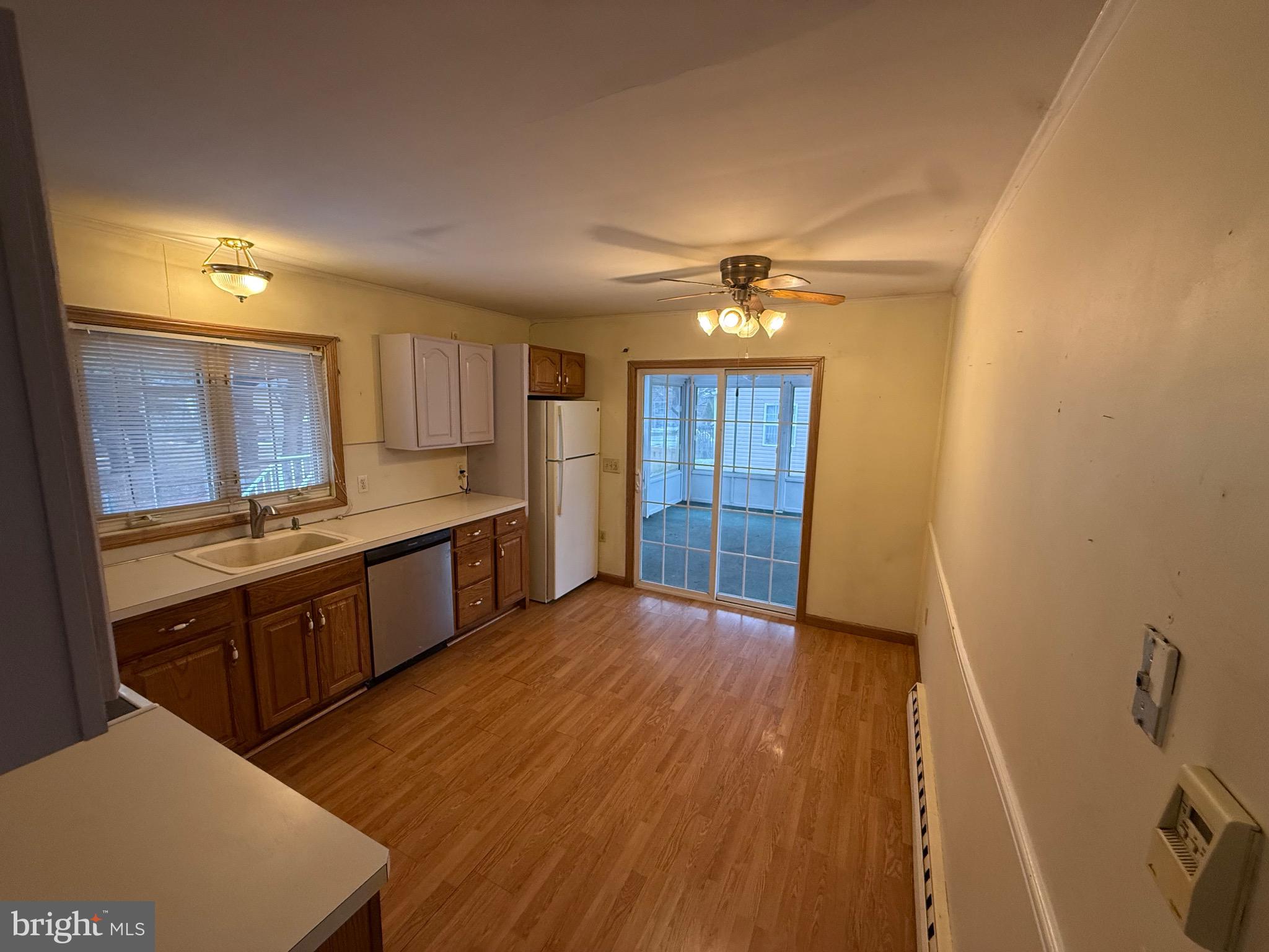730 East Main Street Weatherly, PA 18255 - Photo 8 of 15 Bright and airy kitchen with outdoor access.