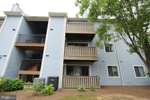 a view of a house with a roof deck