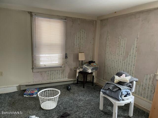 32 North Main Road Otis, MA 01253 - Photo 16 of 30 a living room with furniture a couch and a window