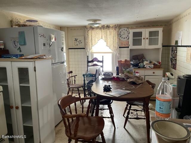 32 North Main Road Otis, MA 01253 - Photo 18 of 30 a view of a dining room with furniture and window