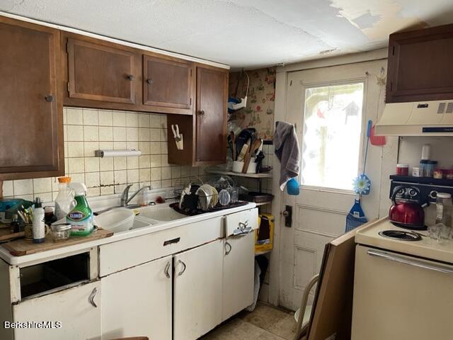 32 North Main Road Otis, MA 01253 - Photo 21 of 30 a kitchen with a sink cabinets and appliances