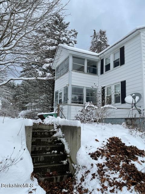 32 North Main Road Otis, MA 01253 - Photo 28 of 30 a front view of a house with a yard