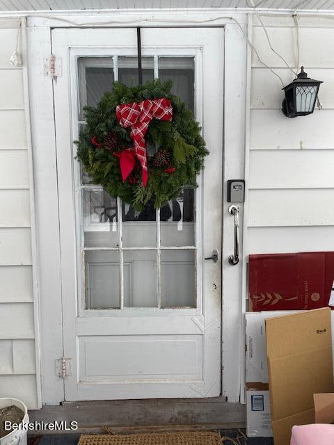 32 North Main Road Otis, MA 01253 - Photo 8 of 30 a view of a house with a potted plant