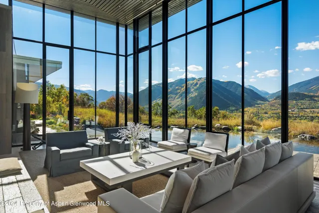 a front view of a house with swimming pool