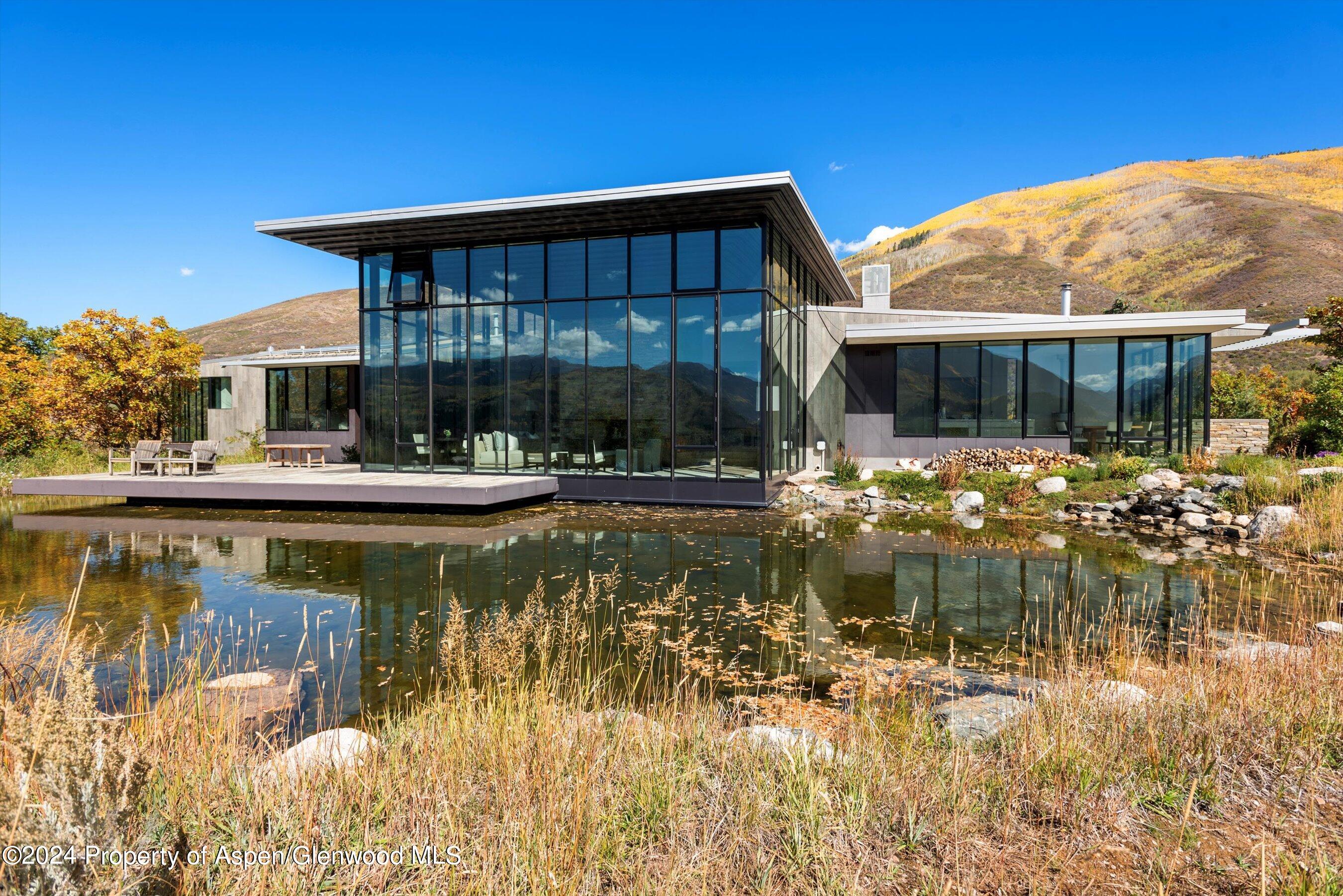 600 Nell Erickson Road Aspen, CO 81612 - Photo 2 of 40 a front view of a house with swimming pool