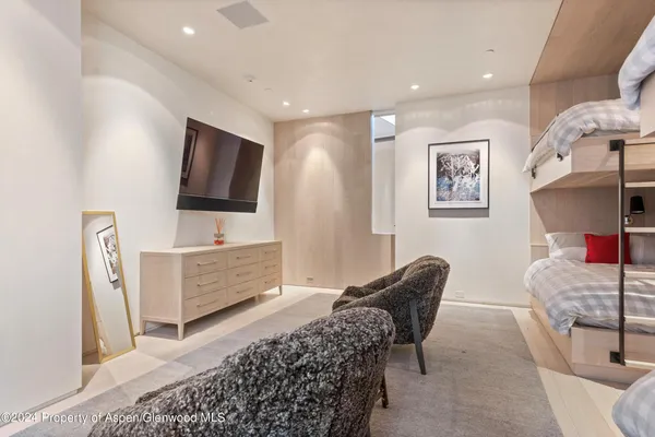 a bathroom with a sink vanity and a mirror