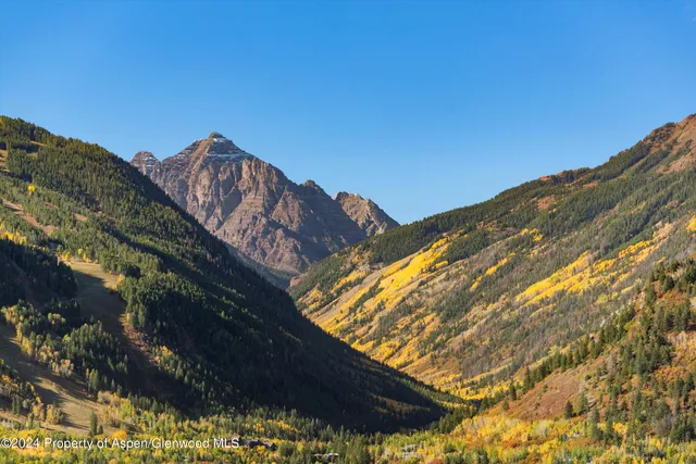 a view of mountain view with mountains in the background