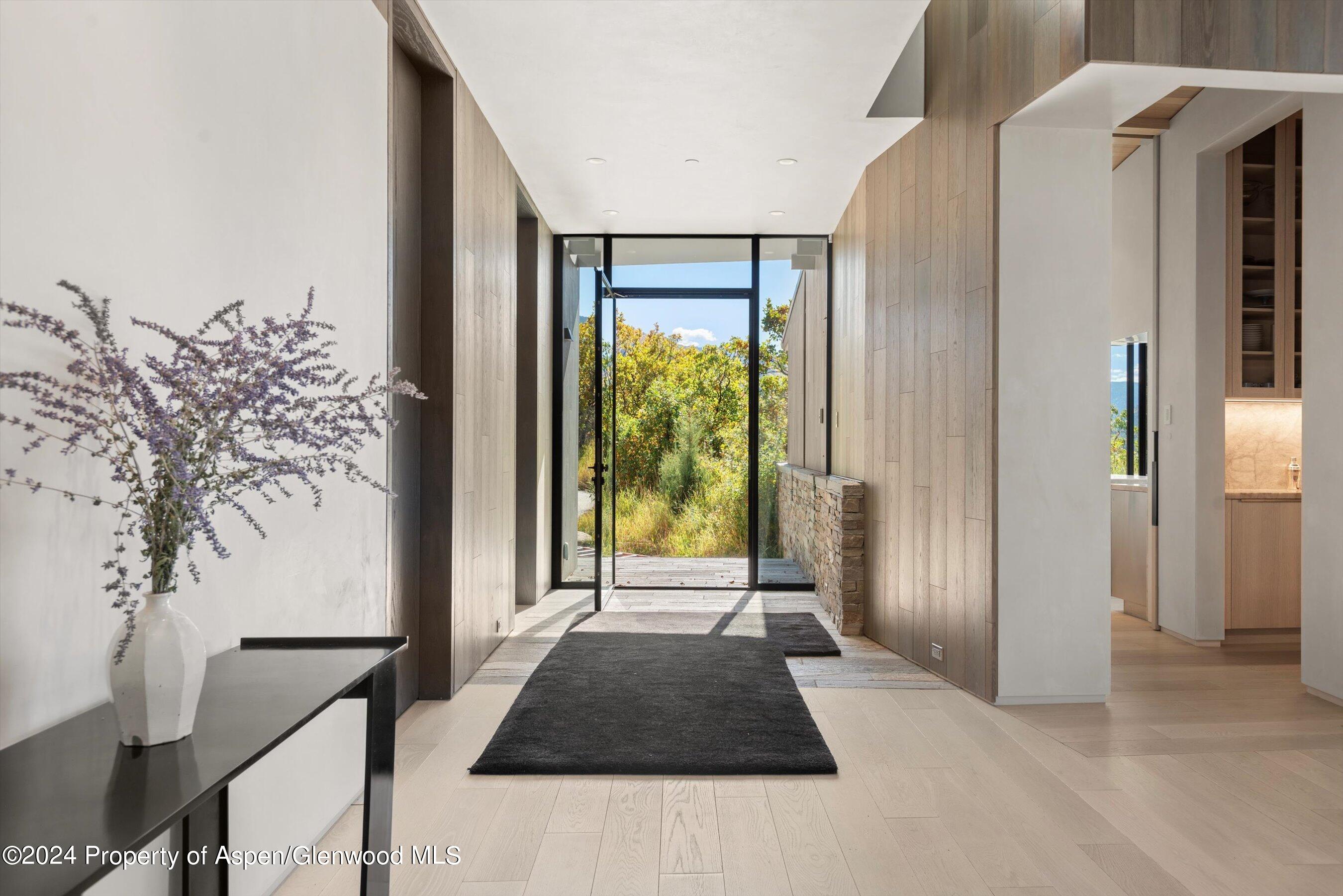 600 Nell Erickson Road Aspen, CO 81612 - Photo 5 of 40 a view of a front door and porch