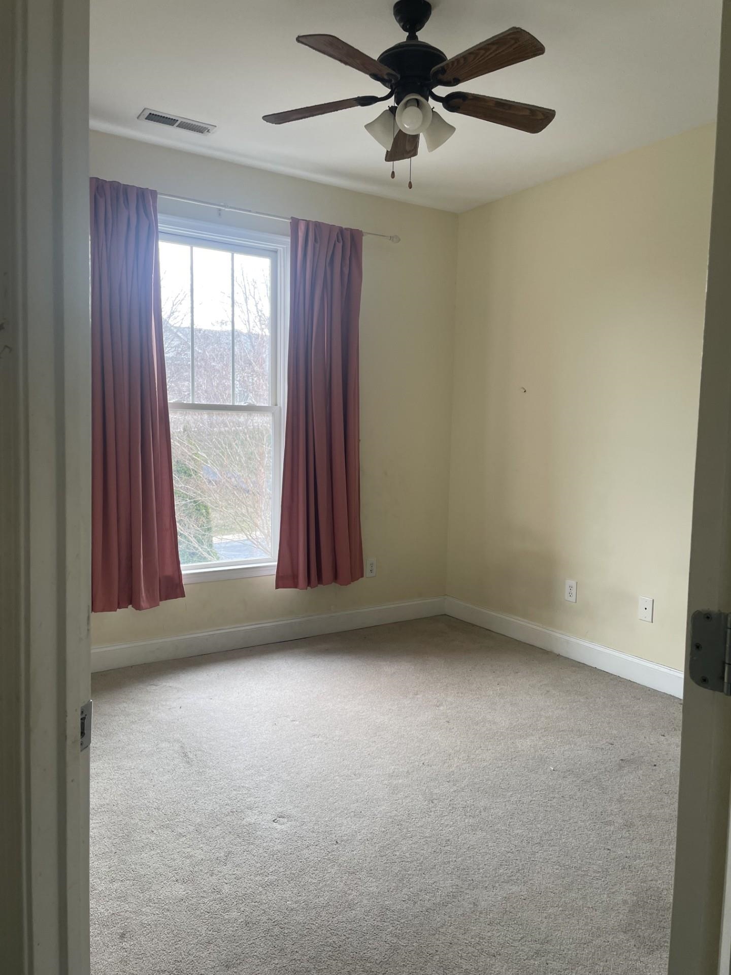 46 Enchanted View Circle Fishersville, VA 22939 - Photo 12 of 16 an empty room with a window and a fan