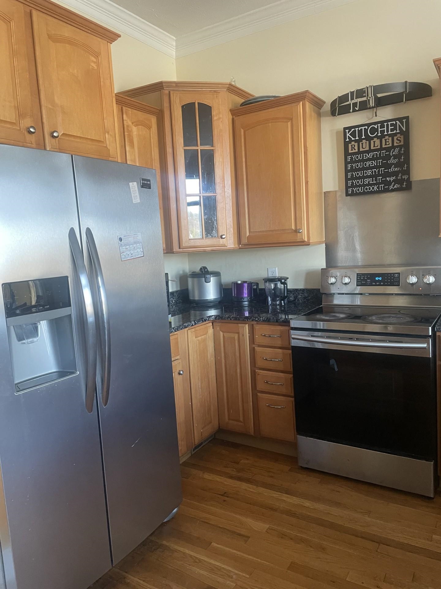 46 Enchanted View Circle Fishersville, VA 22939 - Photo 16 of 16 a kitchen with stainless steel appliances granite countertop a refrigerator a stove a sink and a microwave