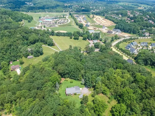 a view of a lake with a yard