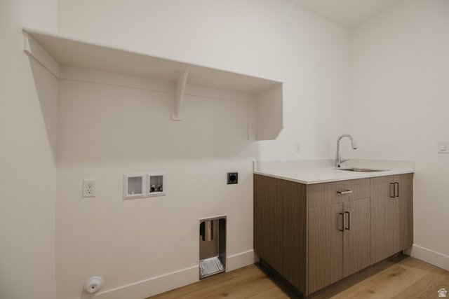 2759 Becco Trail, Unit 16 St. George, UT 84770 - Photo 29 of 42 Laundry area featuring light wood-style floors, washer hookup, electric dryer hookup, and cabinet space