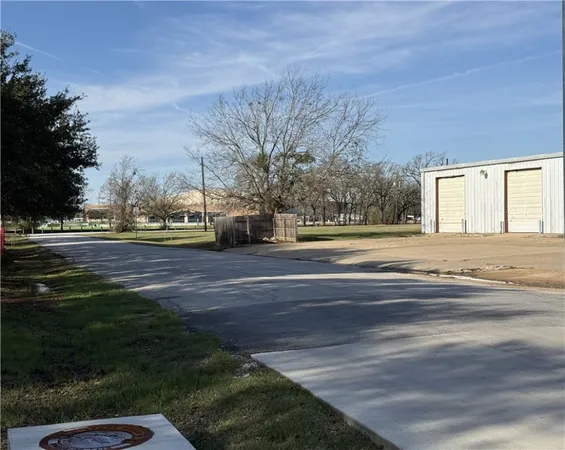a view of street with houses