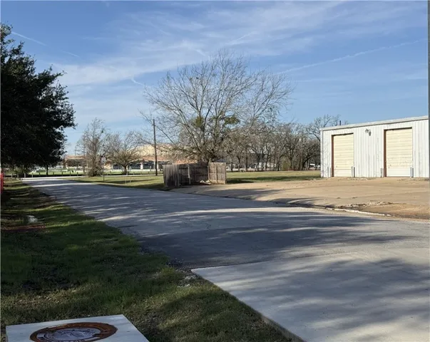 a view of street with houses