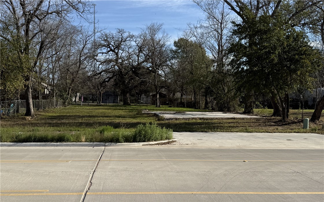 2703 South College Avenue Bryan, TX 77801 - Photo 7 of 7 a view of a house with a big yard