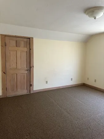 a view of a room with an empty space