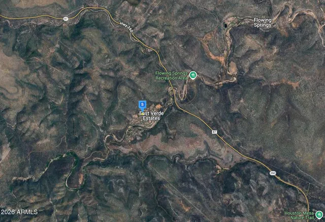 a view of a backyard of the house