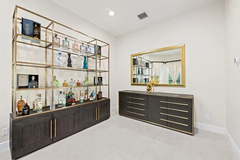 a room with two cabinet and a window