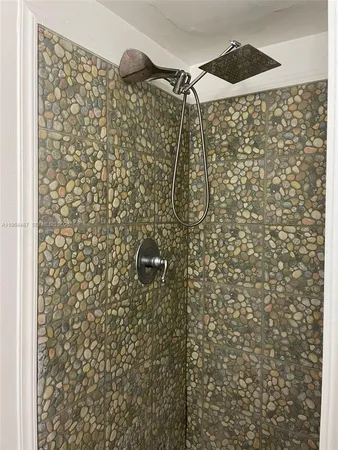 a bathroom with a shower curtain