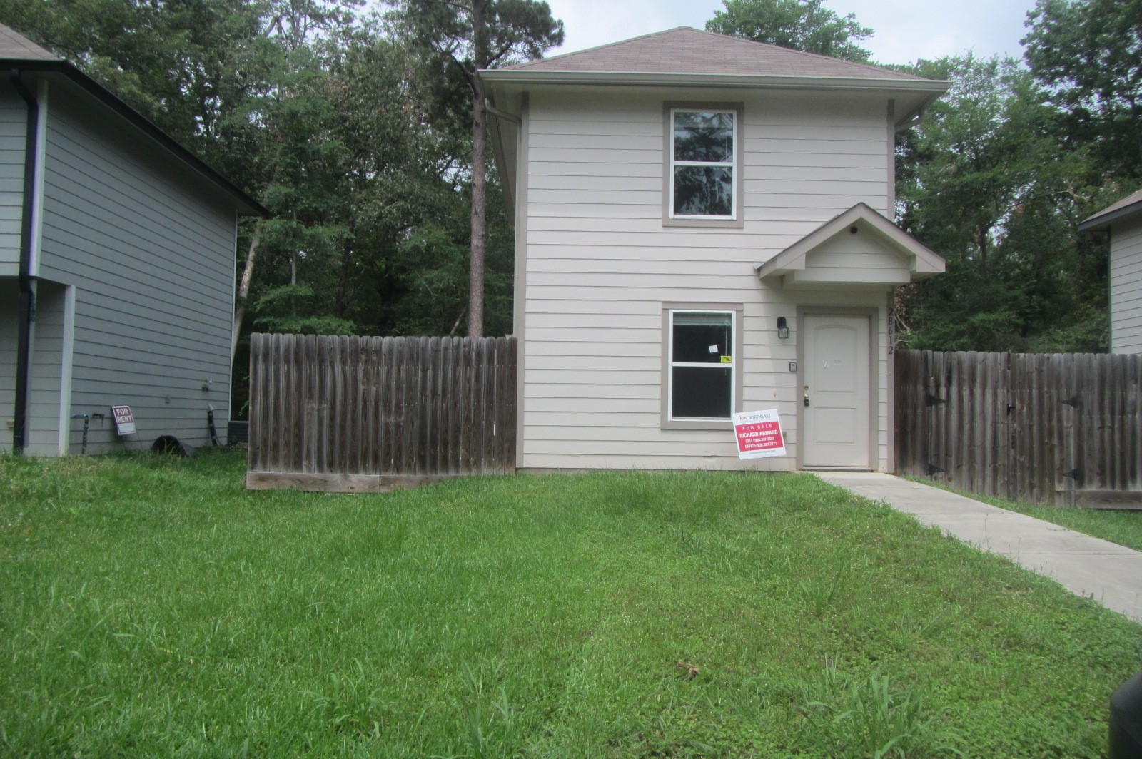 28612 Netawake Court Point Blank, TX 77364 - Photo 1 of 14 a view of a house with a yard and a garden