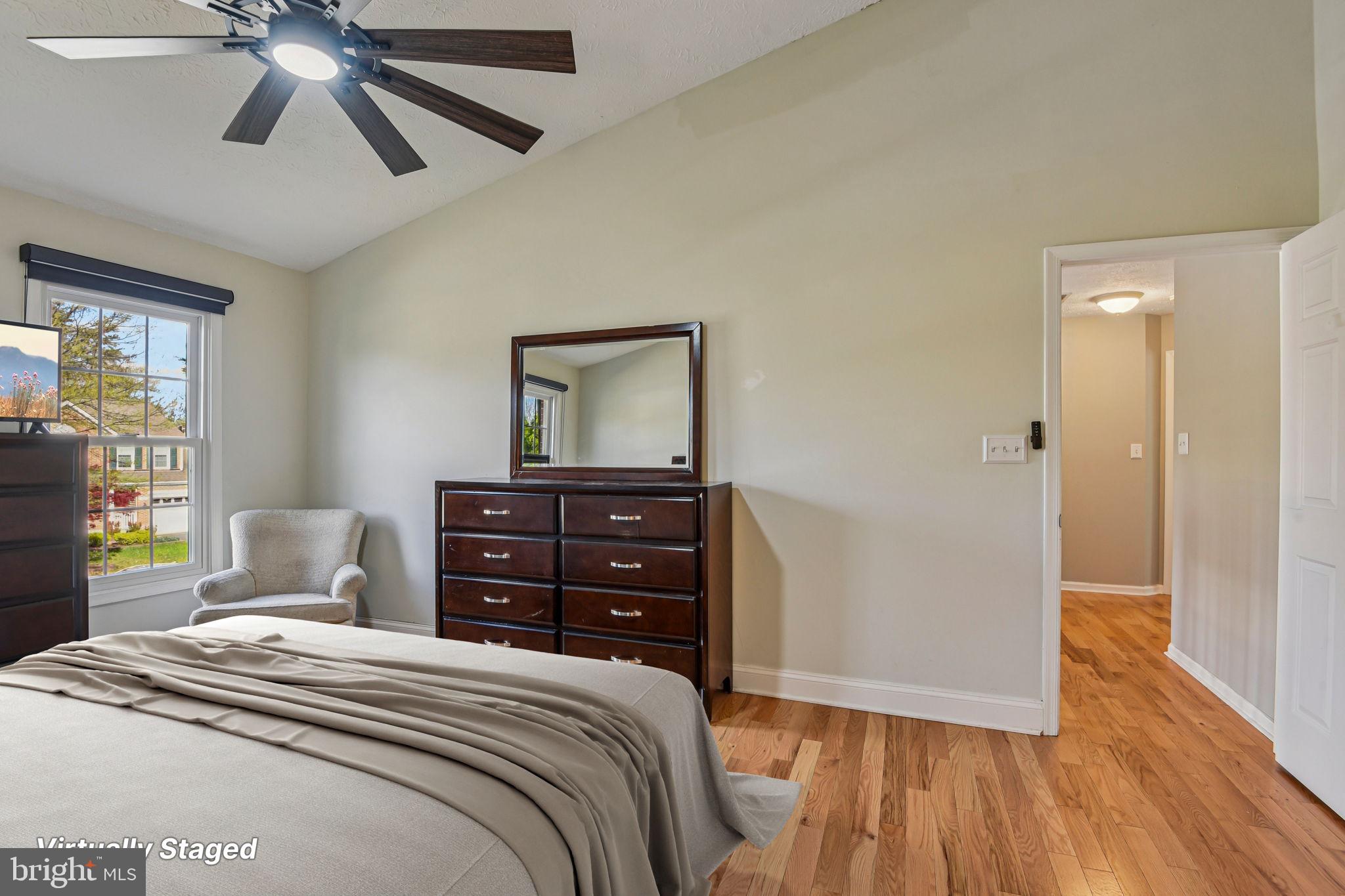 7617 Bear Forest Road Hanover, MD 21076 - Photo 13 of 37 a bedroom with a bed and a dresser