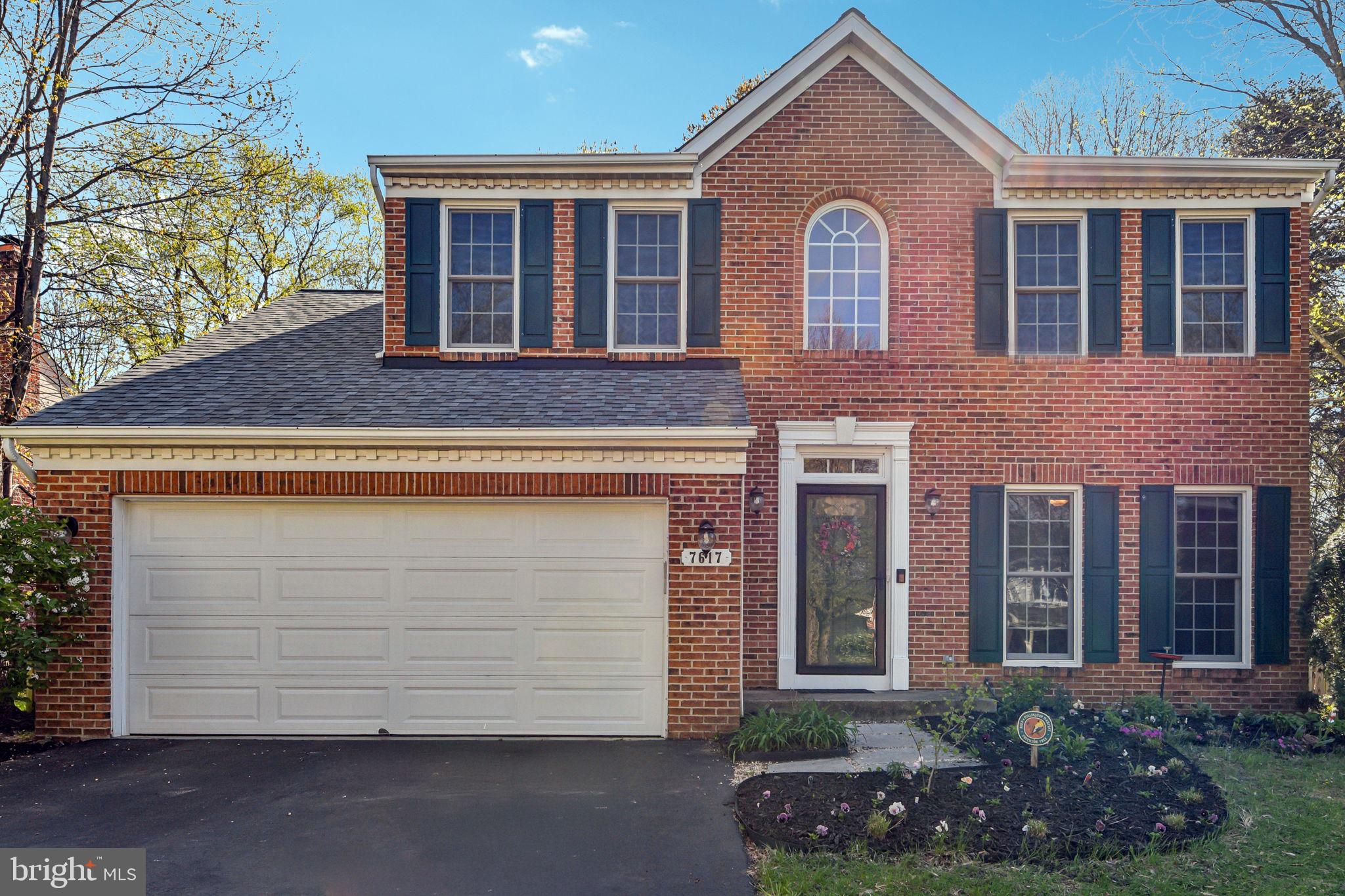 7617 Bear Forest Road Hanover, MD 21076 - Photo 2 of 37 a front view of a house with garden