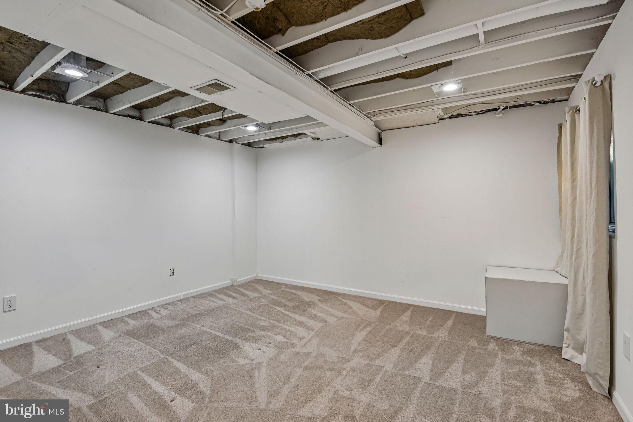 7617 Bear Forest Road Hanover, MD 21076 - Photo 27 of 37 a view of a room with racks on the wall