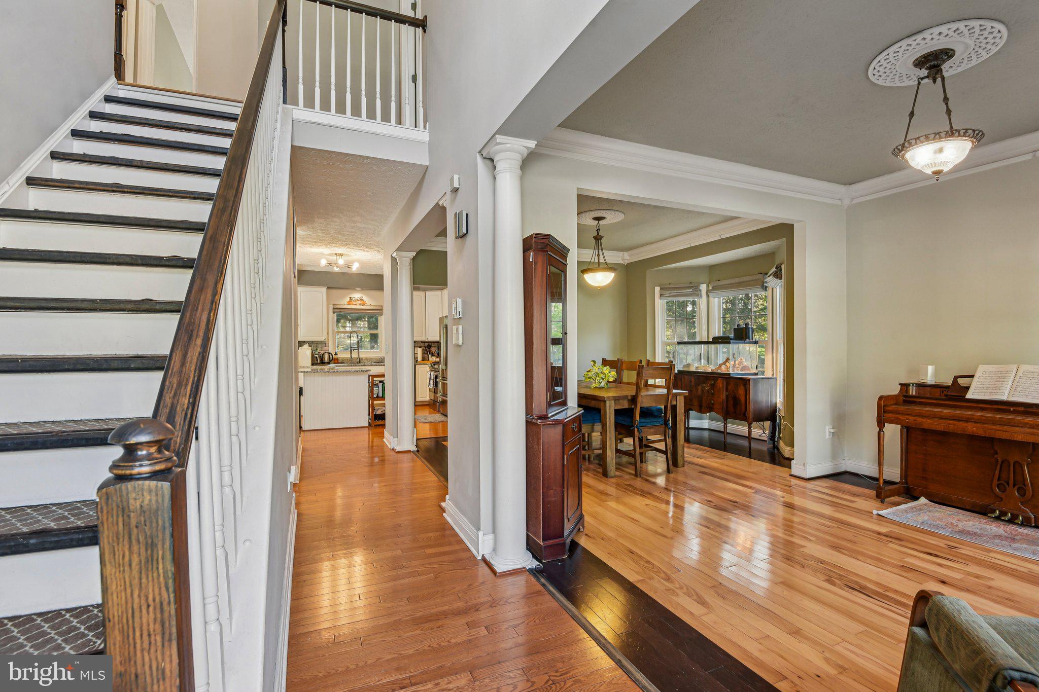 7617 Bear Forest Road Hanover, MD 21076 - Photo 3 of 37 a view of a livingroom with furniture and hardwood floor