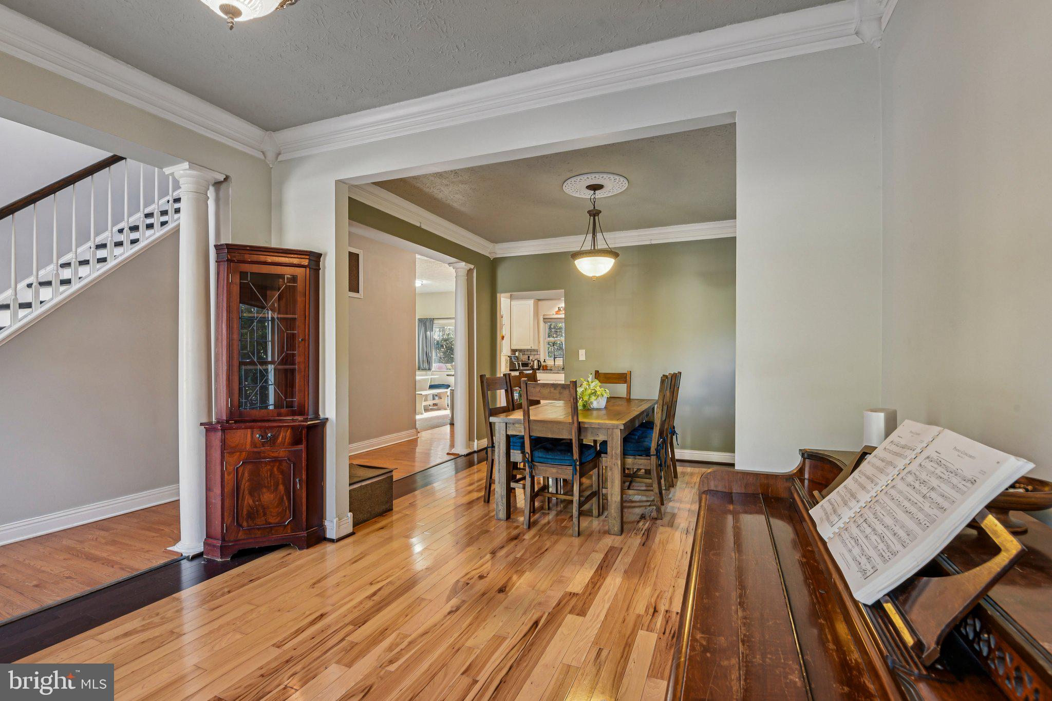 7617 Bear Forest Road Hanover, MD 21076 - Photo 4 of 37 a view of a livingroom with furniture and wooden floor