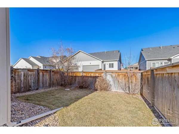 a view of backyard of house