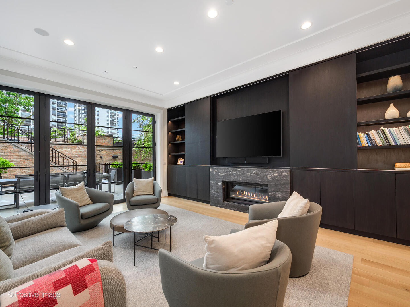 1438 North Dearborn Street Chicago, IL 60610 - Photo 4 of 10 a living room with furniture and a flat screen tv