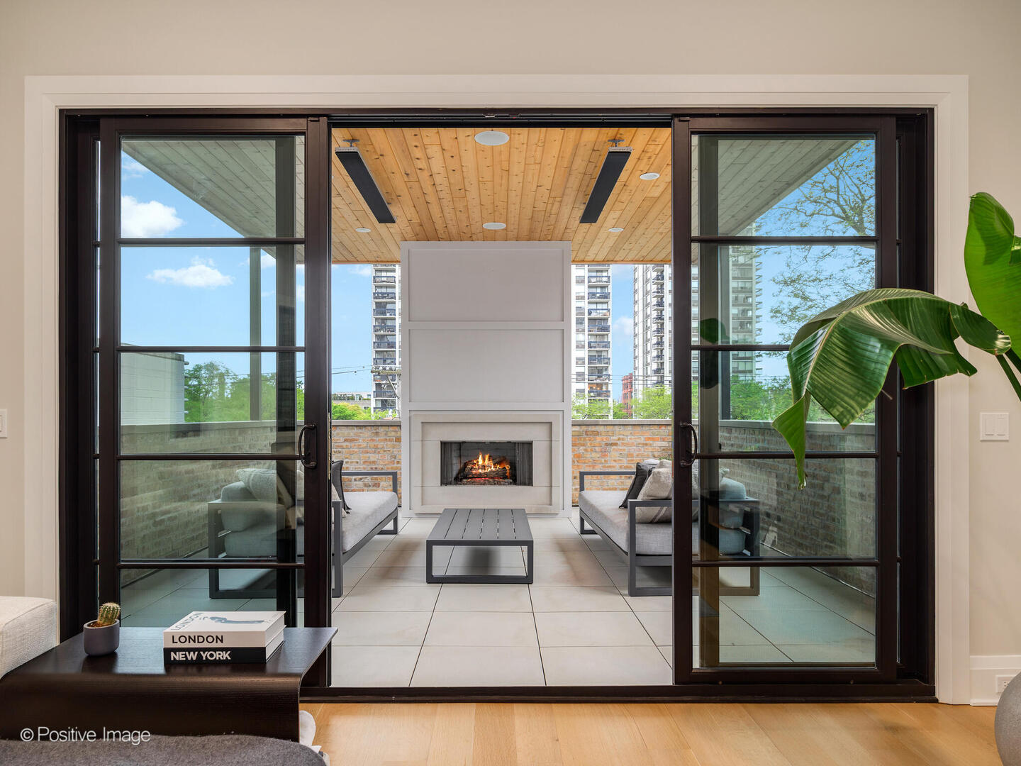 1438 North Dearborn Street Chicago, IL 60610 - Photo 8 of 10 a living room with a couch a table and a large window