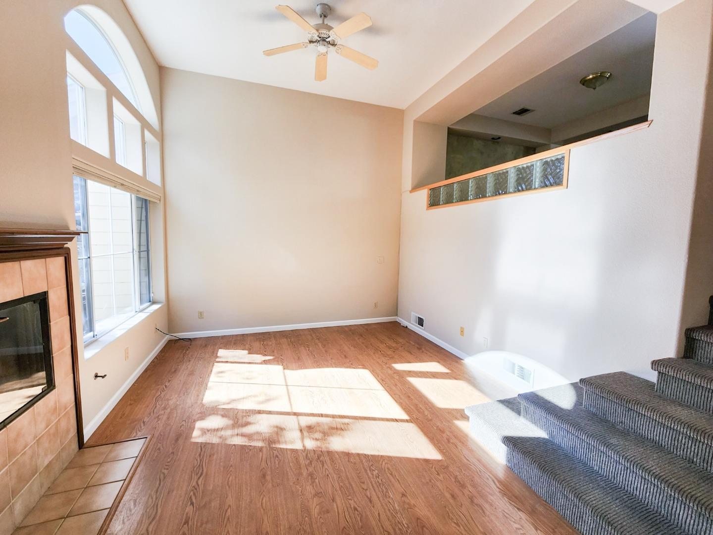 10 Patrick Way Half Moon Bay, CA 94019 - Photo 2 of 11 a view of an empty room with wooden floor and a window