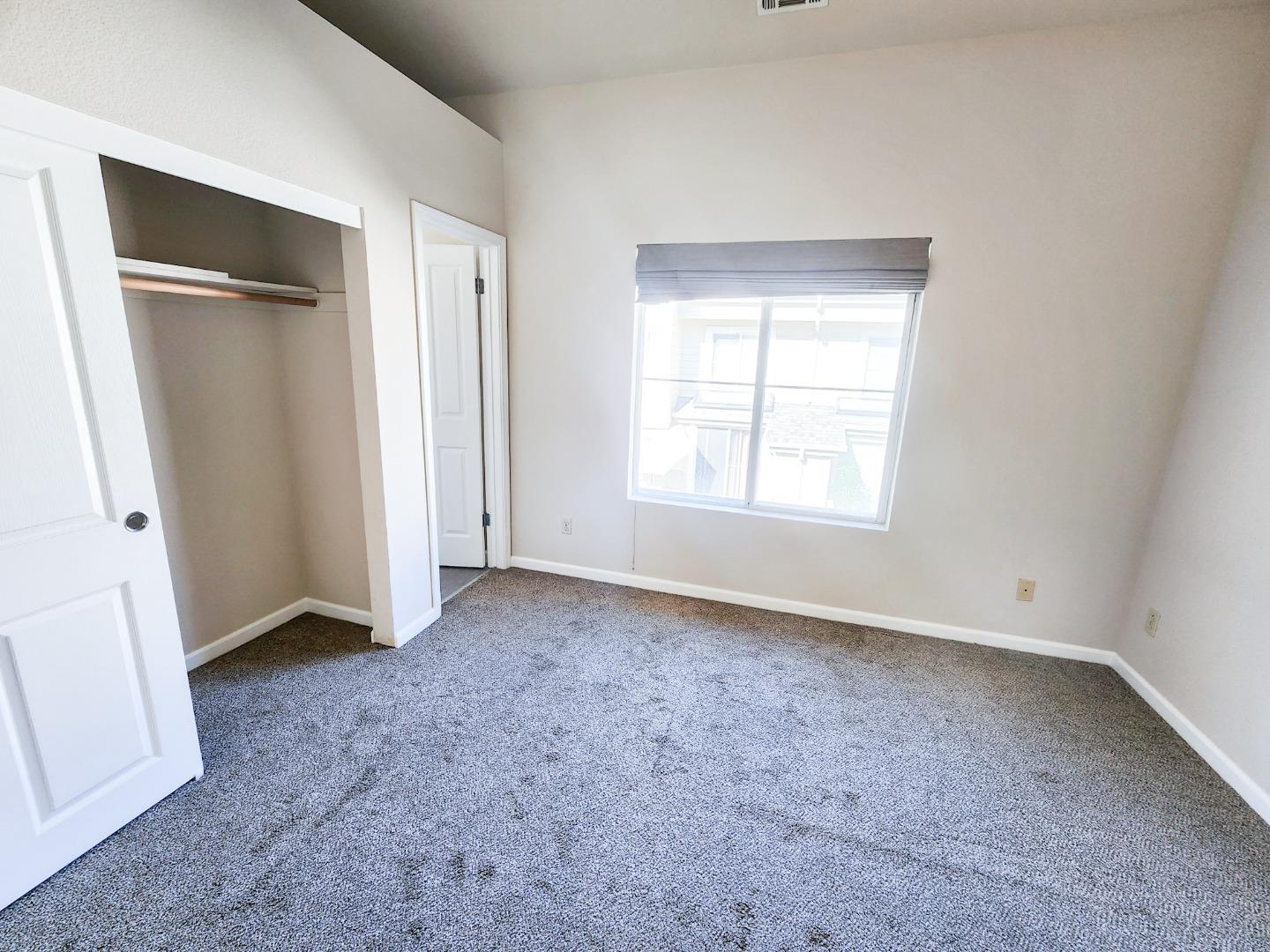 10 Patrick Way Half Moon Bay, CA 94019 - Photo 10 of 11 an empty room with windows