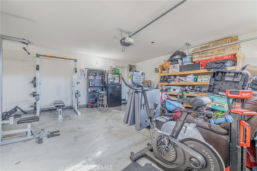43128 Homestead Street Lancaster, CA 93535 - Photo 19 of 33 a view of a room with gym equipment