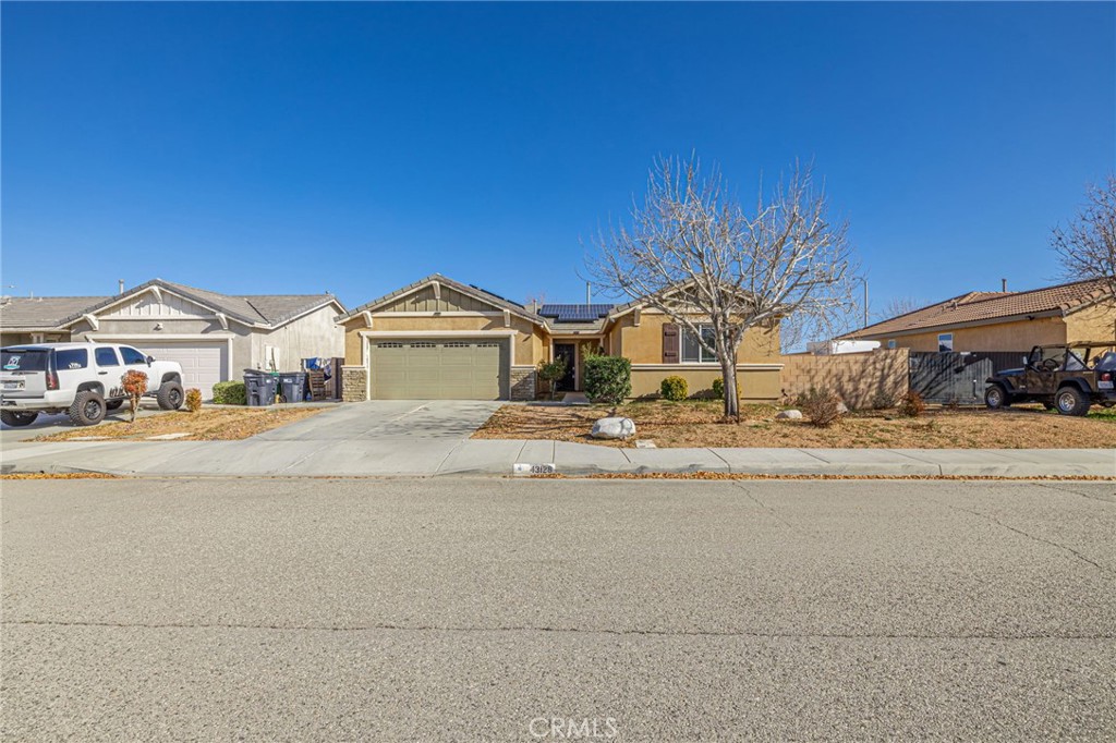 43128 Homestead Street Lancaster, CA 93535 - Photo 5 of 33 a view of house with a outdoor space and sitting area