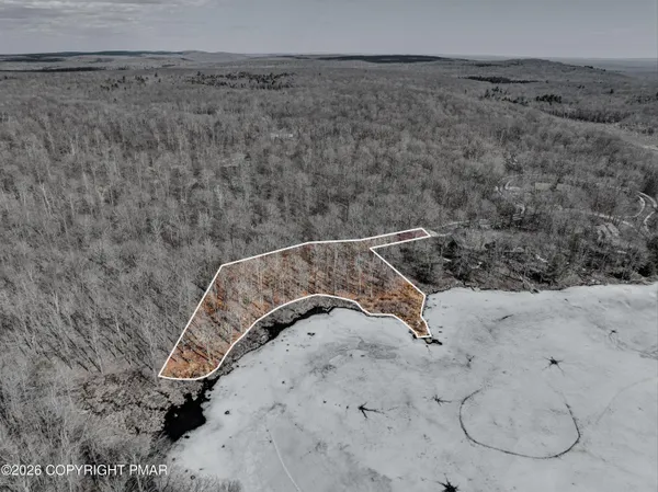 a view of roof and outdoor space