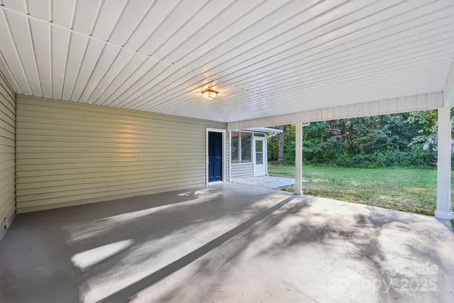 a view of backyard with green space