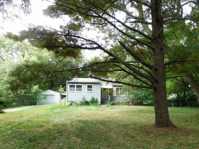 a house view with a garden space