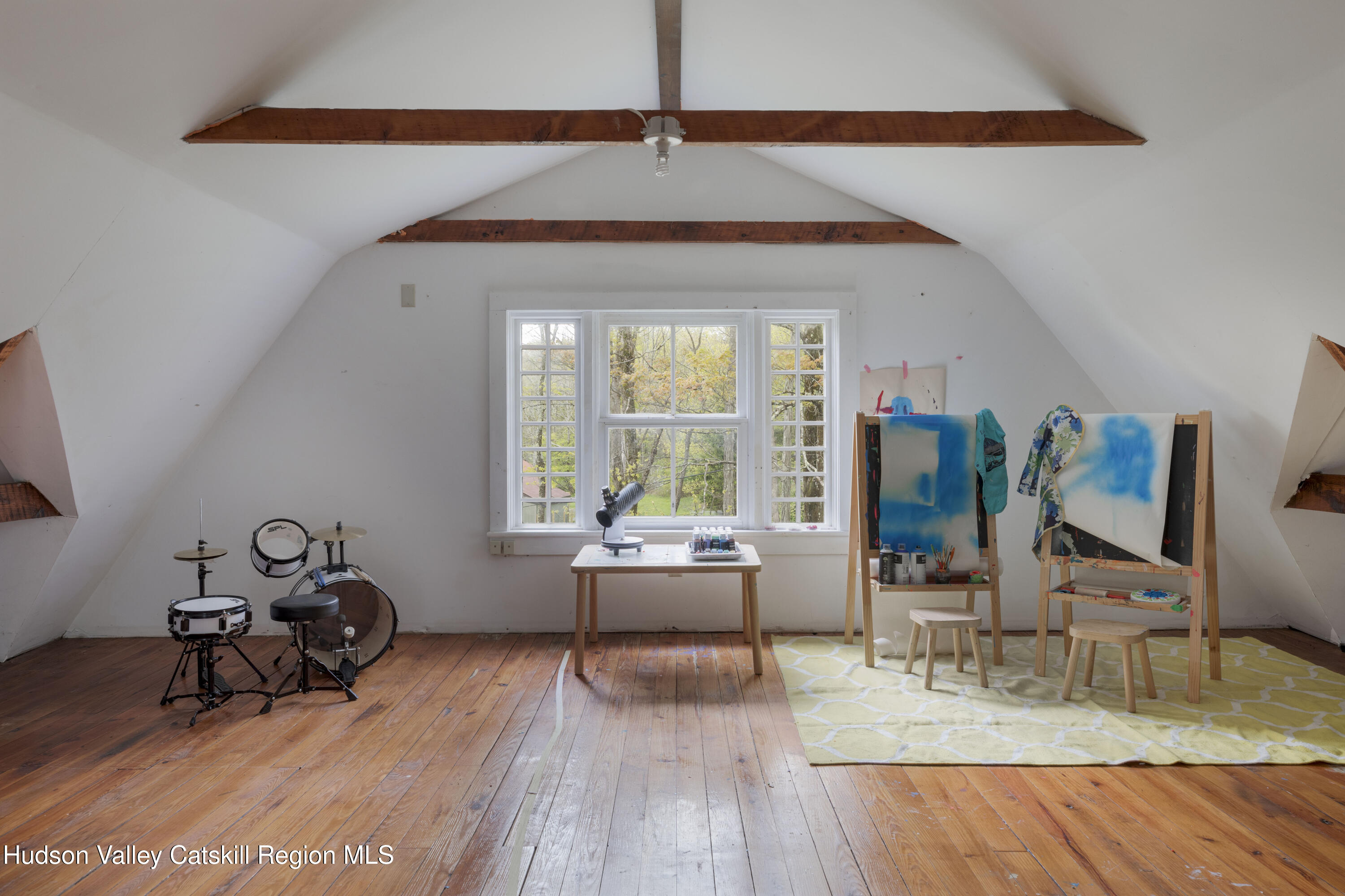 57 Dellenbaugh Road Cragsmoor, NY 12566 - Photo 21 of 26 a living room with furniture and a wooden floor