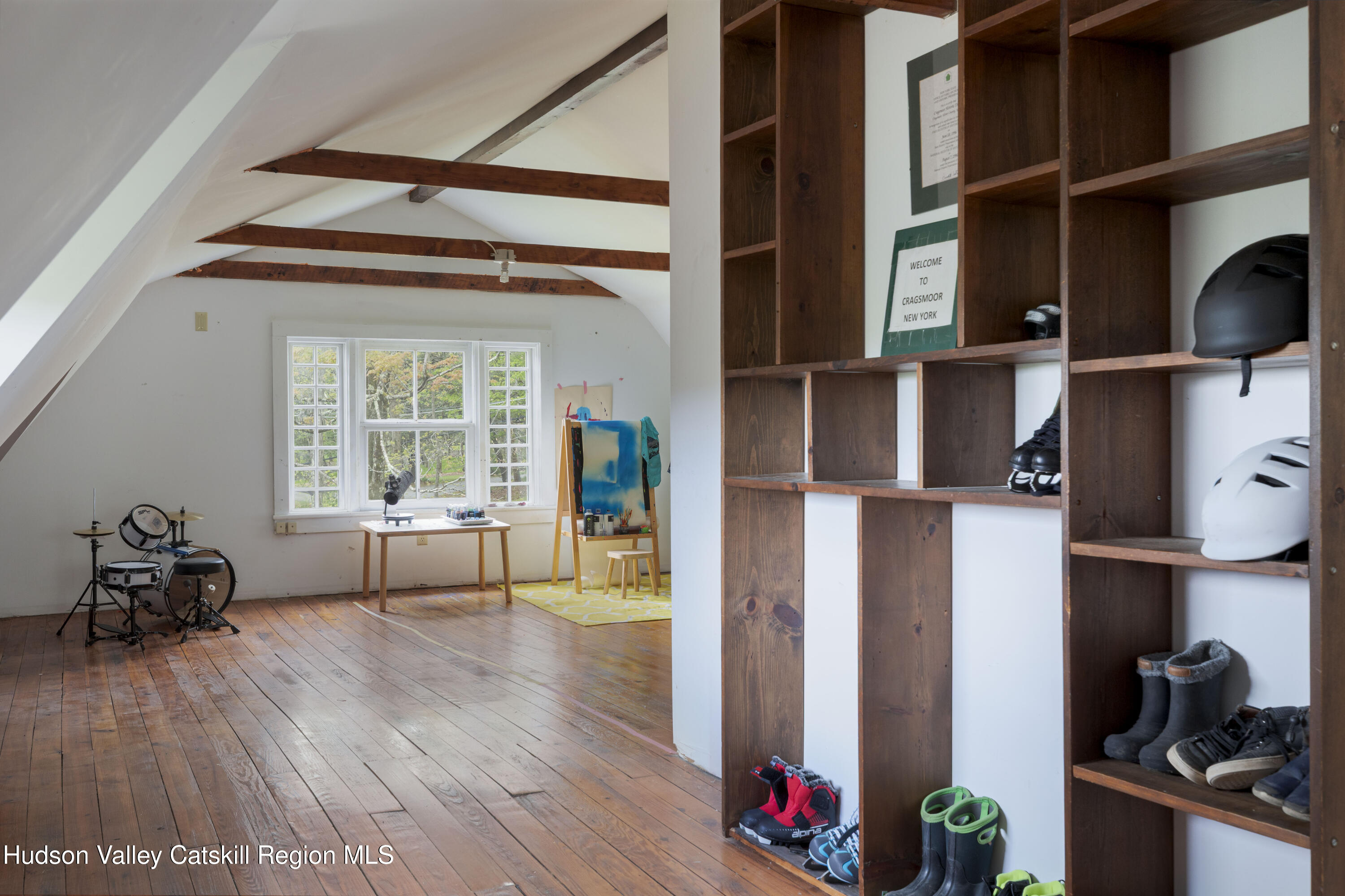 57 Dellenbaugh Road Cragsmoor, NY 12566 - Photo 22 of 26 a living room with furniture and a window