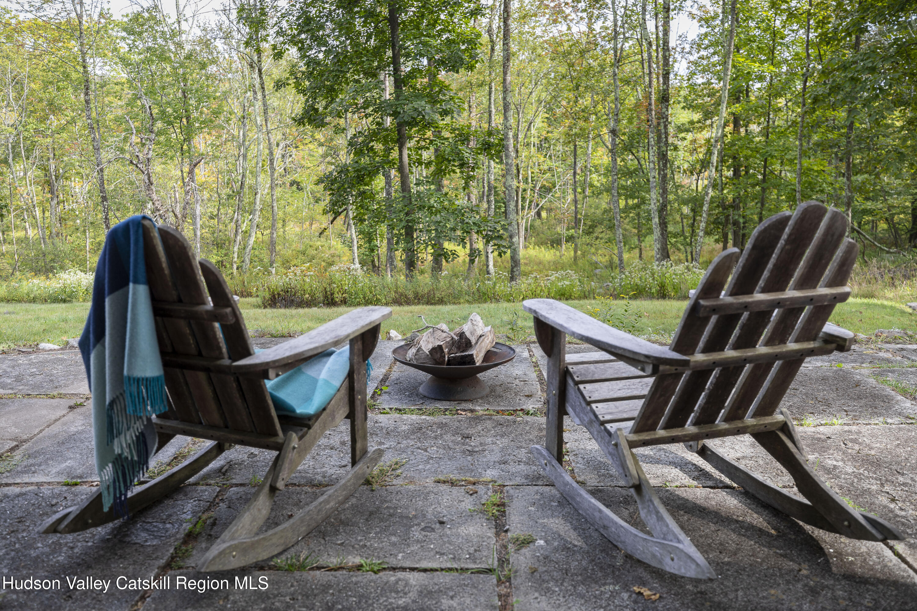 57 Dellenbaugh Road Cragsmoor, NY 12566 - Photo 24 of 26 a view of a patio with couple of chairs