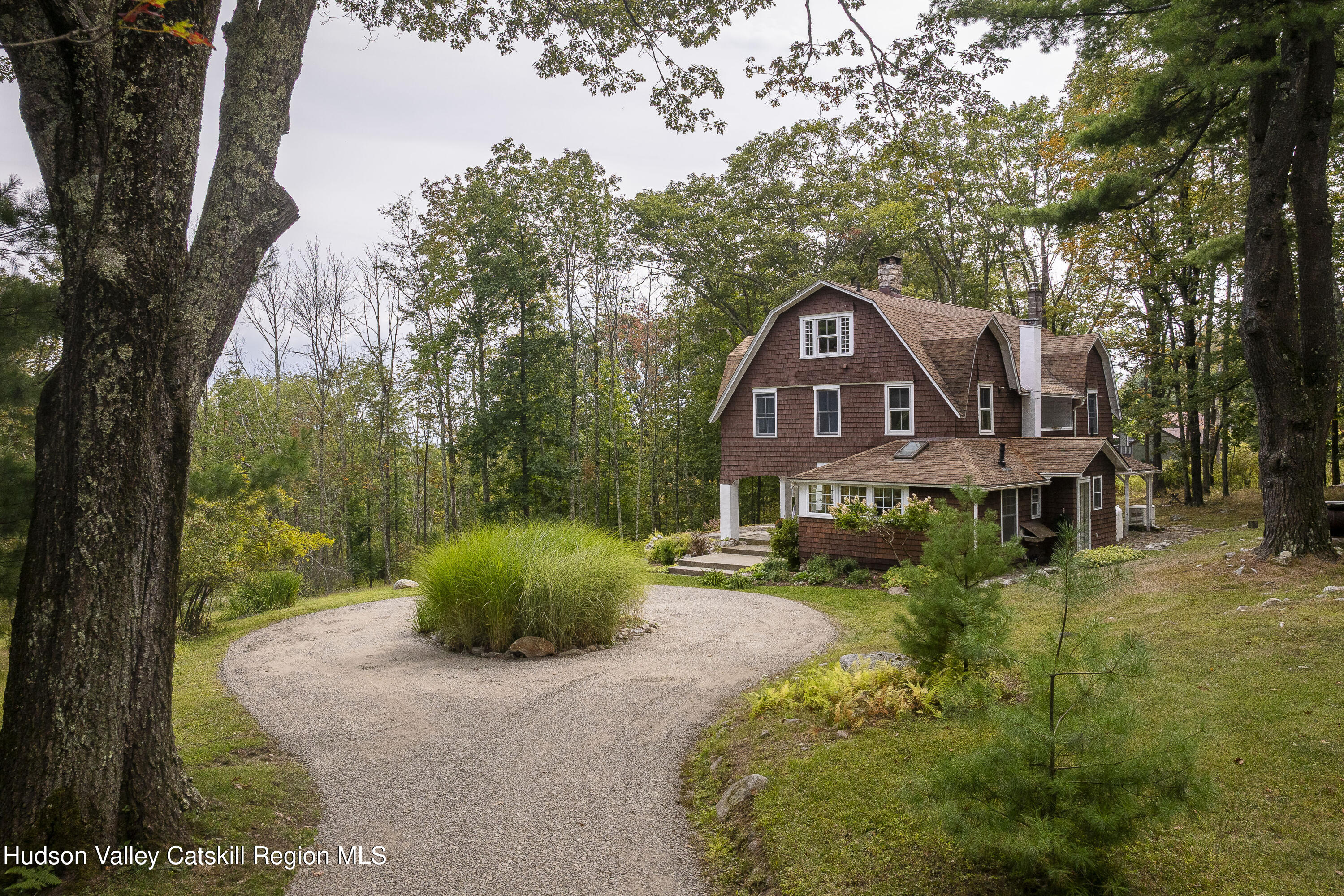 57 Dellenbaugh Road Cragsmoor, NY 12566 - Photo 25 of 26 a front view of a house with a yard